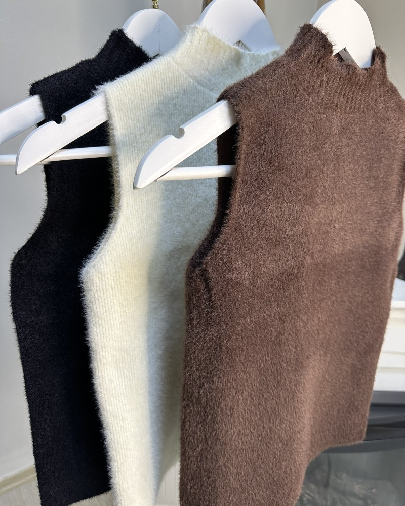 Yarım Balıkçı Yaka Kolsuz Triko Kahverengi Yarım Balıkçı Yaka Kolsuz Triko Kahverengi